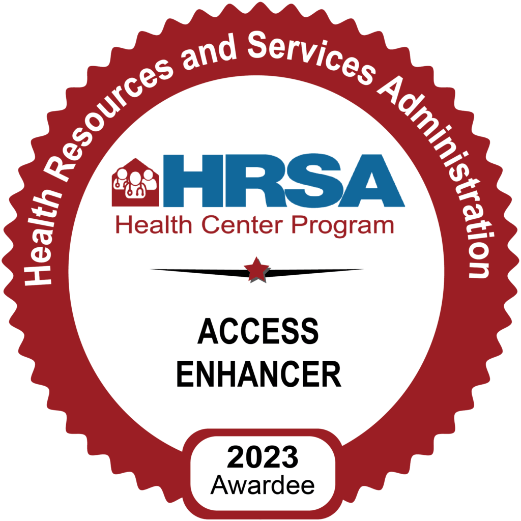 A red and white badge reads Health Resources and Services Administration, Health Center Program, ACCESS ENHANCER, 2023 Awardee with the HRSA logo at the top.