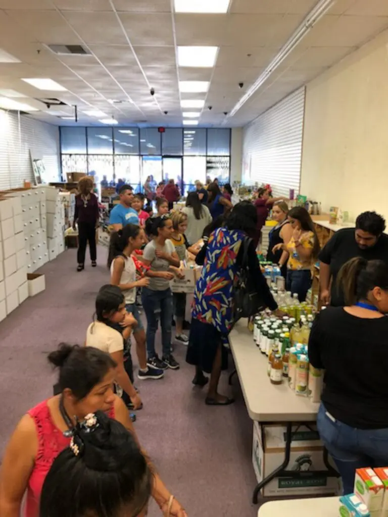 2017 ROADS Thanksgiving Food Drive – people lined up for food.